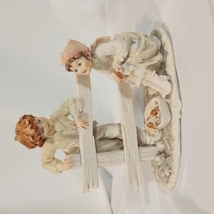 1983 Bruno Merli Capodimonte Boy and Girl with Puppies signed Sculpture